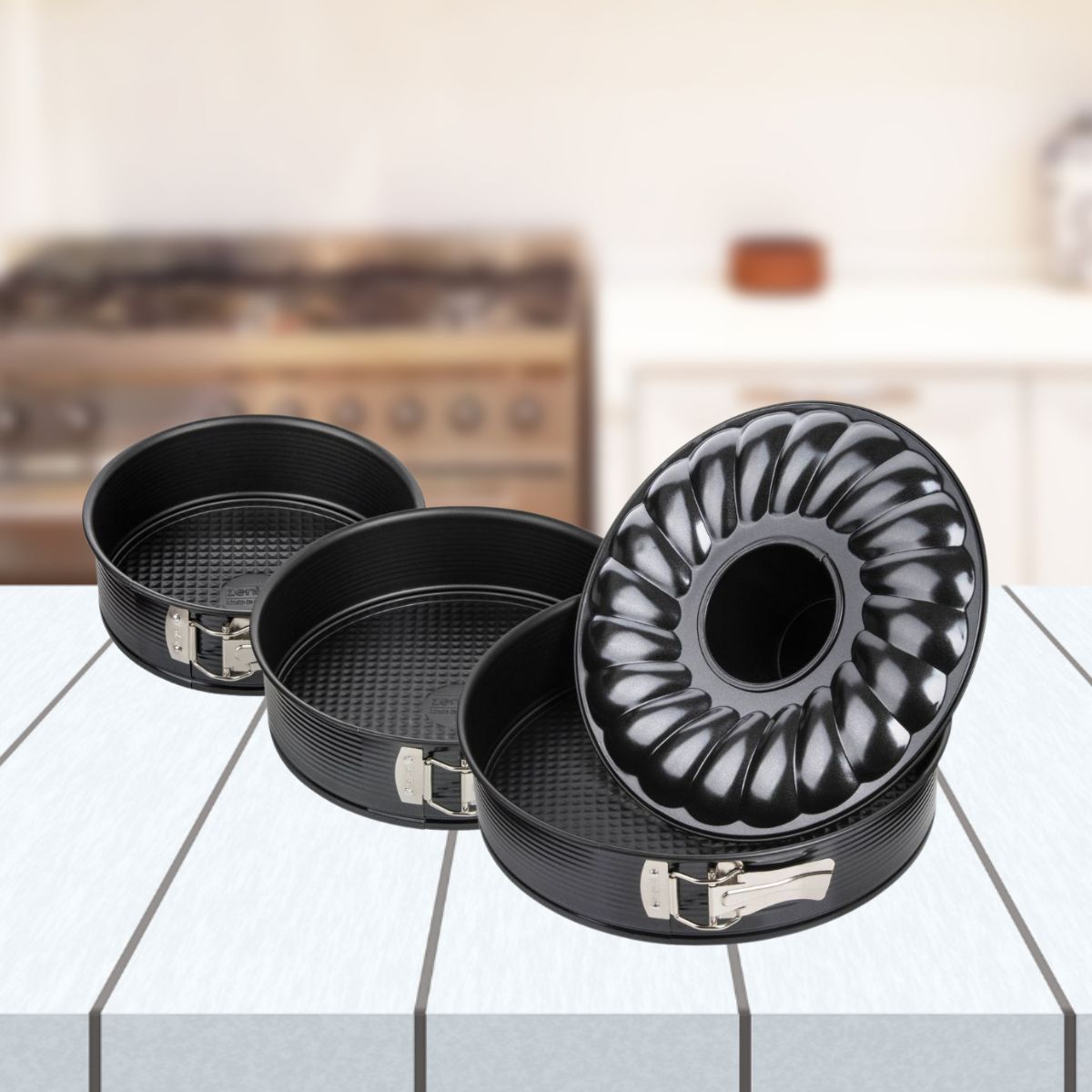 Set de 2 moules à manqué et 1 moule à manqué et savarin diamètres différents Zenker Black Metallic
