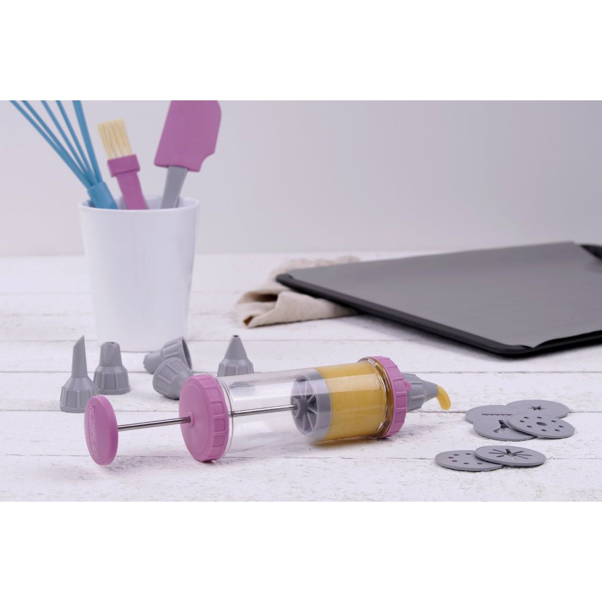 Seringue de pâtisserie type poche à douille avec 6 embouts et 6 disques à motifs Zenker