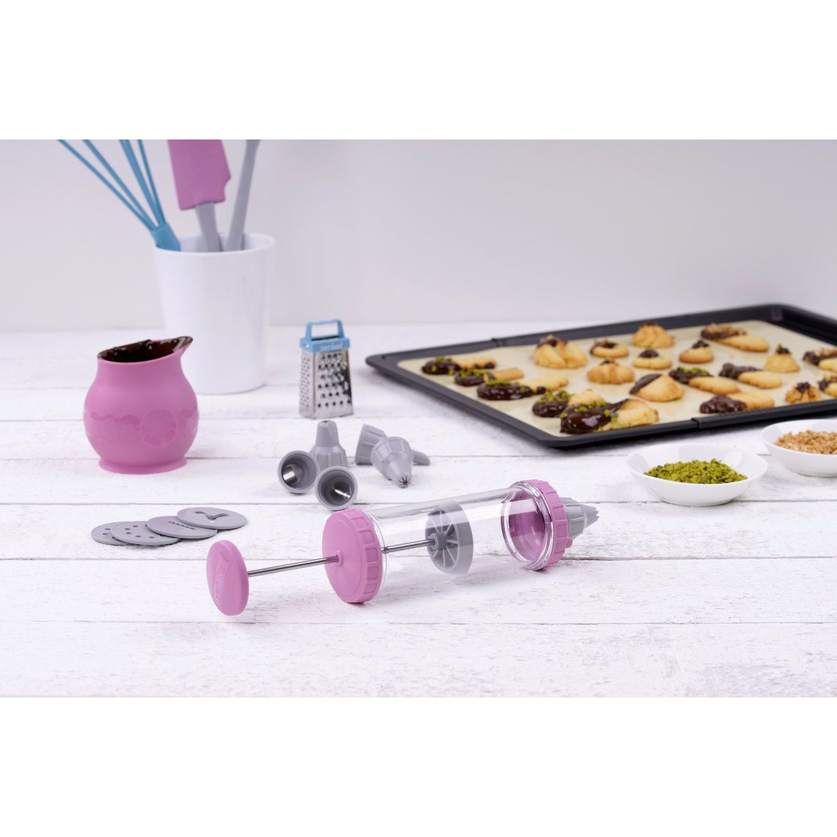 Seringue de pâtisserie type poche à douille avec 6 embouts et 6 disques à motifs Zenker